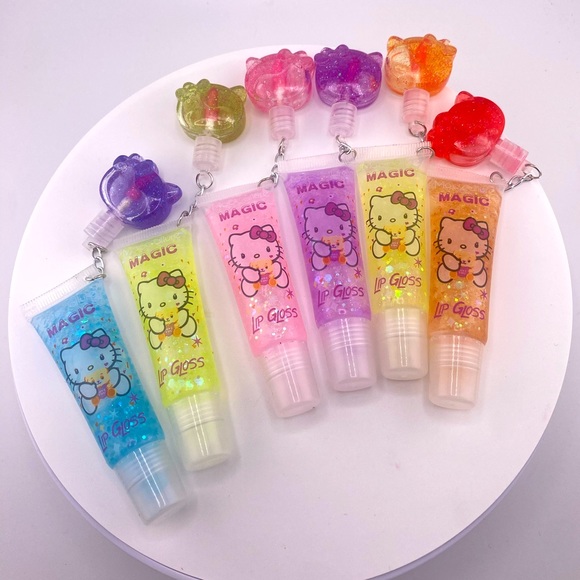 Hello Kitty Other - Hello Kitty 6 Pack Lip Gloss With Keychain Mini Lip stain - New